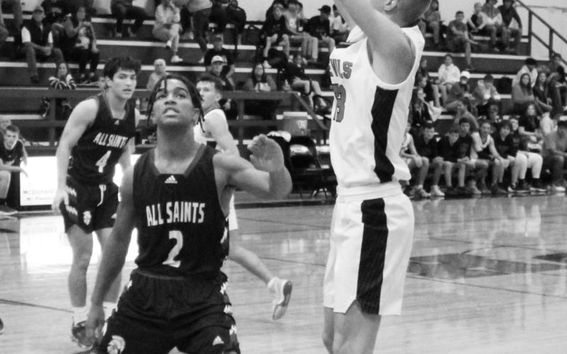 Red Devils defeat Trojans