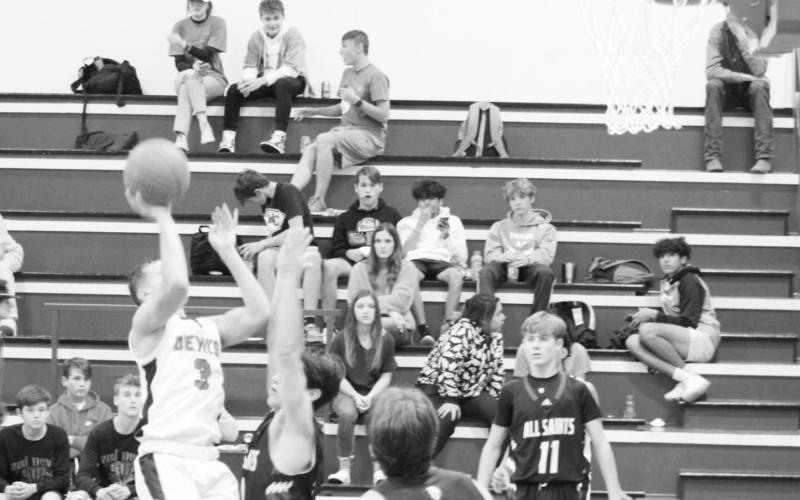 Red Devils defeat Trojans