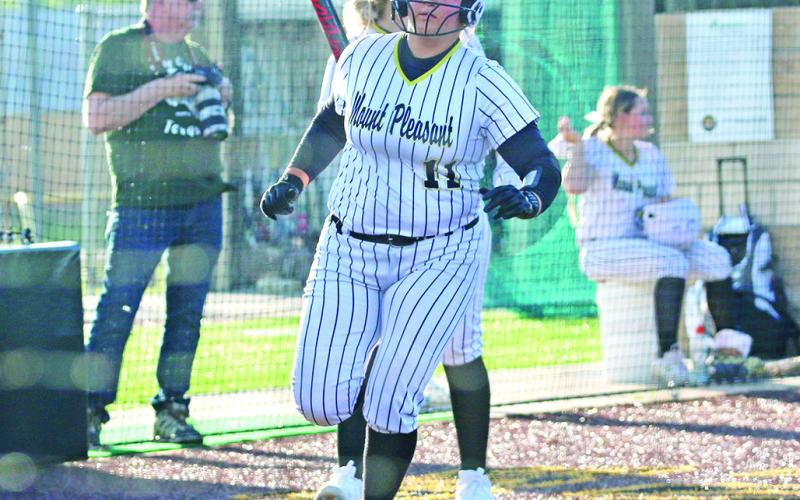 Mount Pleasant’s Lakyn Fortenberry makes her way home for a run during the Lady Tigers’ game Friday against Tyler High. Mount Pleasant won the district matchup, 17-0. TRIBUNE PHOTO / QUINTEN BOYD