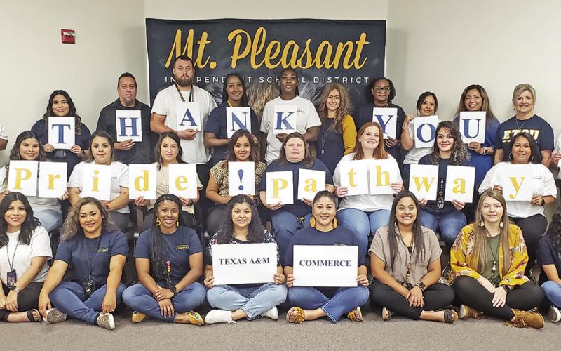 Members of the Texas A&amp;;M—Commerce Pride Pathway program with (left) Judd Marshall, Superintendent of MPISD, and (right) Deb Malone, Deputy Superintendent of MPISD and Eva Beles, Director of MPISD Bilingual and ESL Education. COURTESY PHOTO