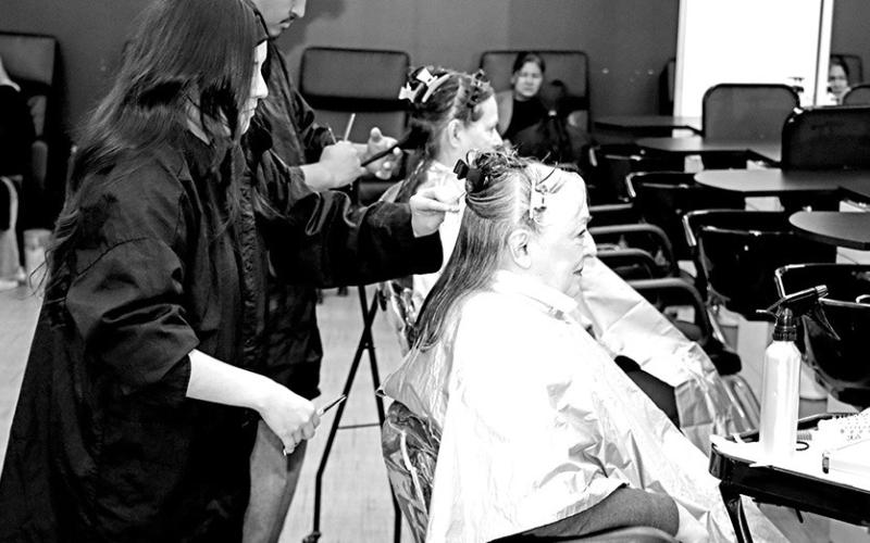 MPHS senior Aradeliz Alarcon cuts a client’s hair