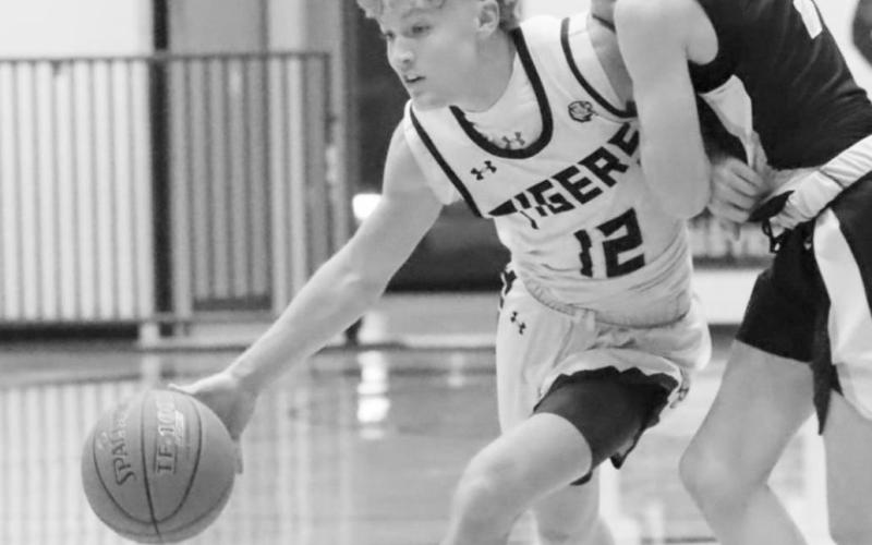 Charity stripe woes doom Tigers in OT