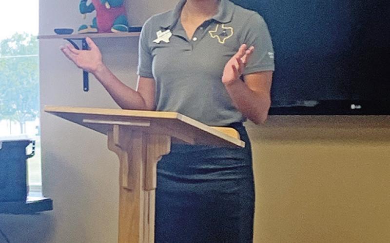 Greco delivers a speech at camp