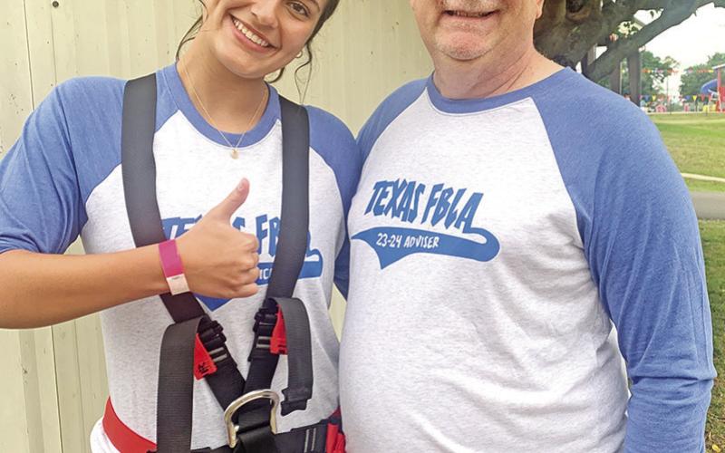 Greco and Whitten prepare for a ropes course challenge COURTESY PHOTOS