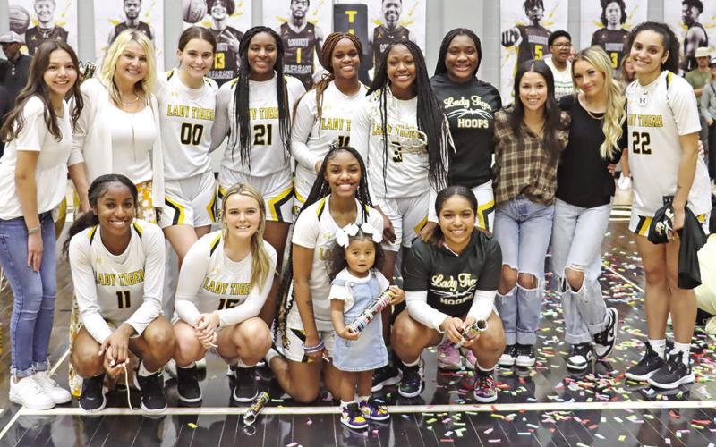 The Mount Pleasant Lady Tigers, 33-0 and ranked fifth in 5A, will open the playoffs Monday at Tyler Legacy High School against the Nacogdoches Lady Dragons (14-17). Tip-off is at 6:30 p.m. PHOTO BY JOHN WHITTEN