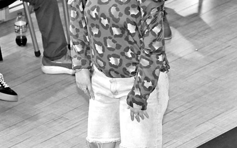 ChrisSortomodelsforFashionDesign2student,EmilyOrtiz VeronicaRegaladomodelsapieceYvetteCervantes’scollection, “Cheetah Chic”