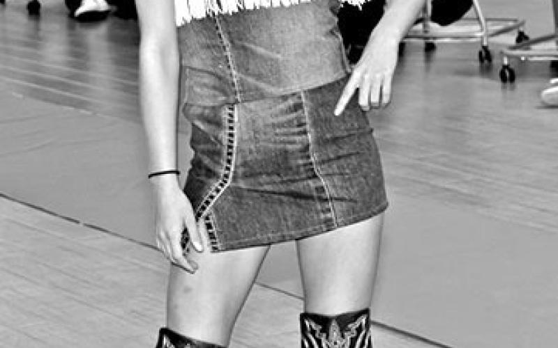 Aaliyah Dela Rosa models a denim set designed by Gabby Zachry