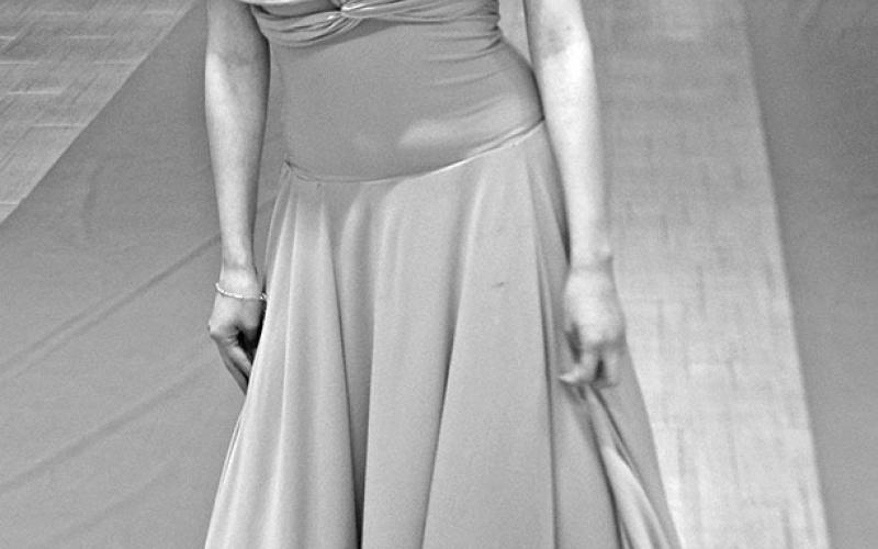 Joeslyne Ramirez models the pink dress she designed