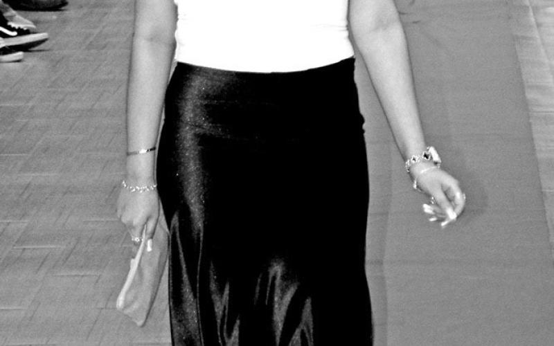 Yolie Rodriguez wearing a strapless dress designed by Leslie Cassio Courtesy Photos