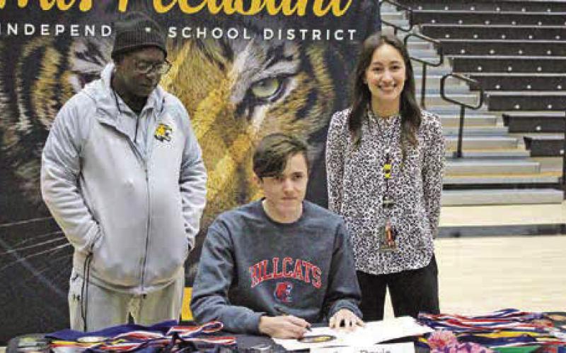 Tiger cross-country and distance runner Lee Davis signed his letter of intent to run at Rogers State University in Claremore, Okla. The NCAA Division II Hillcats are part of the Mid-America Intercollegiate Athletics Association. COURTESY PHOTO