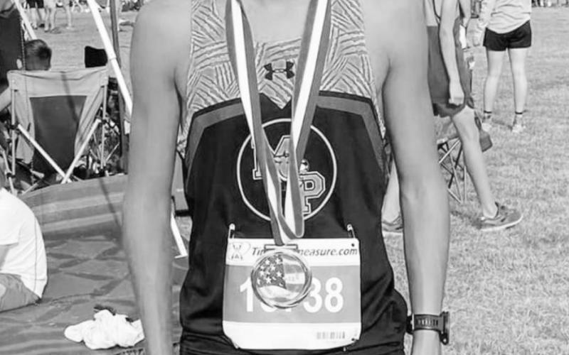 Geovanni Calderon poses with his top ten medal. COURTESY PHOTOS / JUDY RETANA