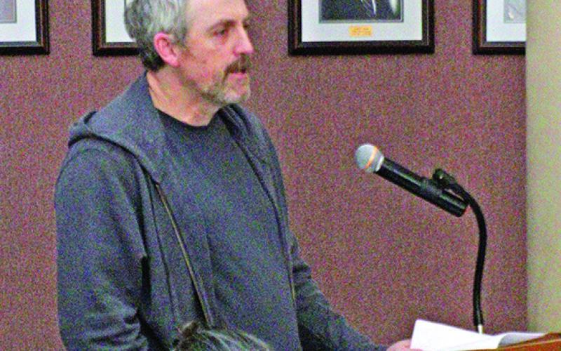 Andrew Arnold presents annual audit.