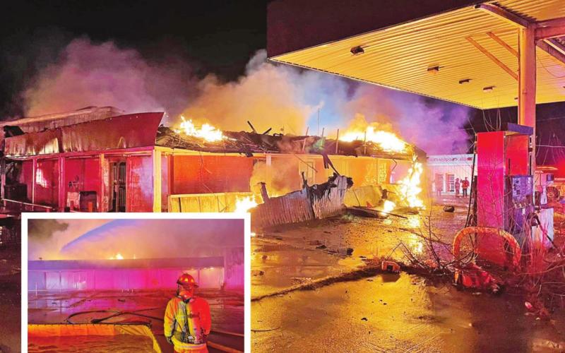 Crews began efforts to put out the flames at 9:47 p.m. Mount Pleasant Fire Captain Phil Fry is shown (bottom left) at the scene. PHOTOS BY JUSTIN HARGROVE