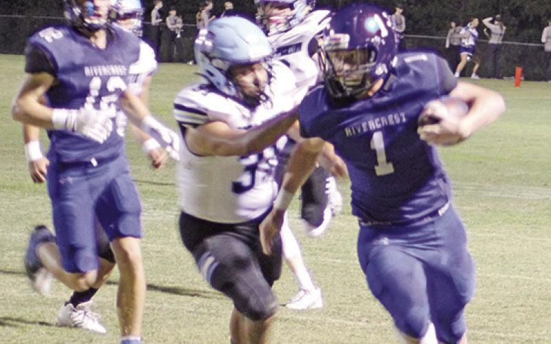 Connor Young speeds away from the Como-Pickton defense on his way to his second touchdown of the night. The Rebels defeated the Eagles, 27-6, and will look to extend their winning streak Friday at district favorite Cooper. TRIBUNE PHOTO / QUINTEN BOYD