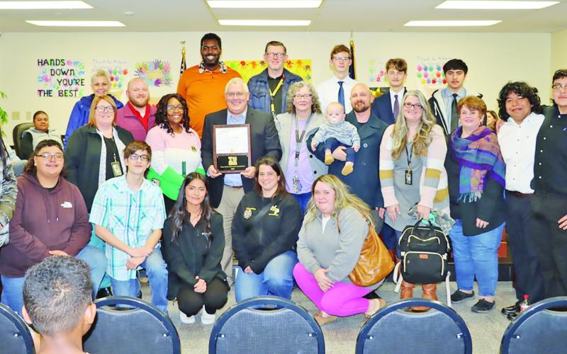 MPISD Superintendent, Judd Marshall (center), with MPISD music teachers and students COURTESY PHOTO