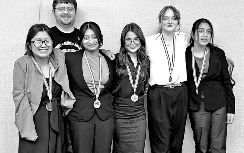 MPHS Congressional Debate team (L to R) Natalia Aspeitia, MPHS Debate coach Joel Whitaker, Gopi Amin, Sabrina Otero- Svirska, Caitlin Anderson, Raquel Garza COURTESY PHOTO
