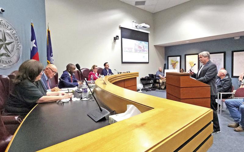 Schneider Electric talks about water meter replacement progress during November 5 Mt. Pleasant city council meeting. TRIBUNE PHOTO / NICOLE KIMBALL