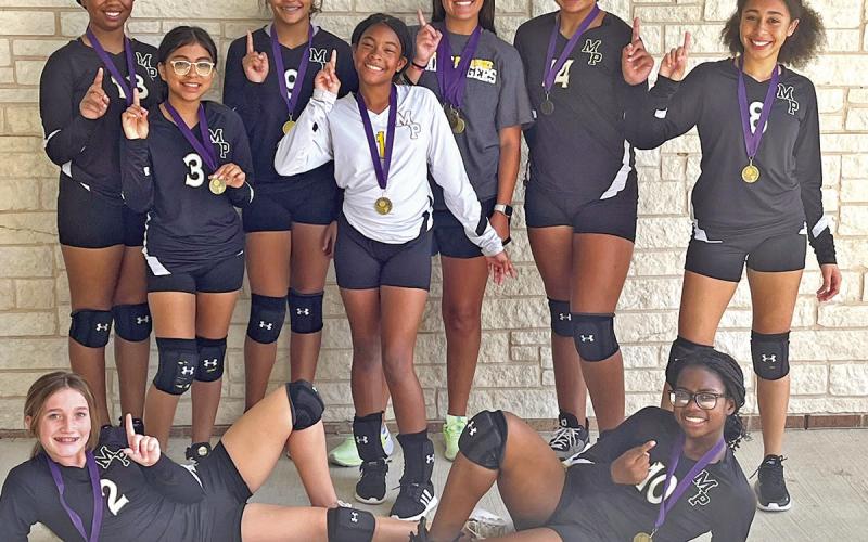 Front row (L to R): Tenley Marshall and Kennedy Jones. Back row (L to R): Aubrey Canton, Gracie Rodriguez, Asia Salters, Khiya Bolton, Coach Taylor Bernal, Ava McCrumby, and Maliyah Hammons. COURTESY PHOTO