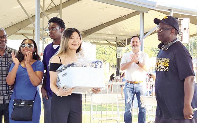 A petting zoo and pony rides provides fun for all Cecilia Pham, one of five recipients for the Whalyn Payne Memorial scholarship