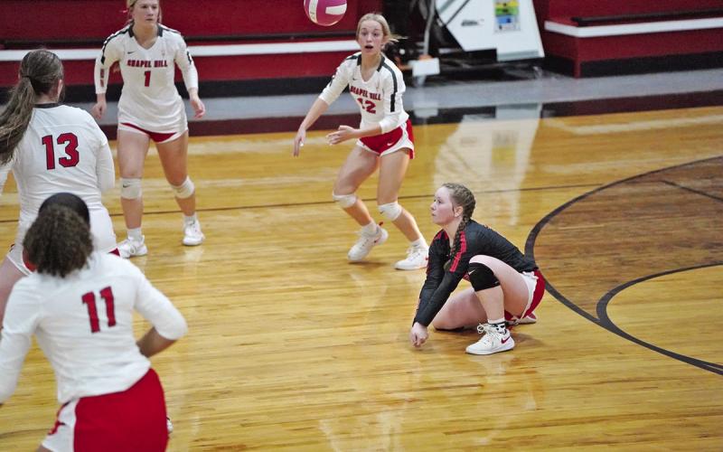 Chapel Hill’s Hannah Rhea drops to a knee for a dig during last Tuesday’s matchup against Quitman. The Lady Devils traveled to Harmony Friday and will host Mount Vernon Tuesday. COURTESY PHOTO