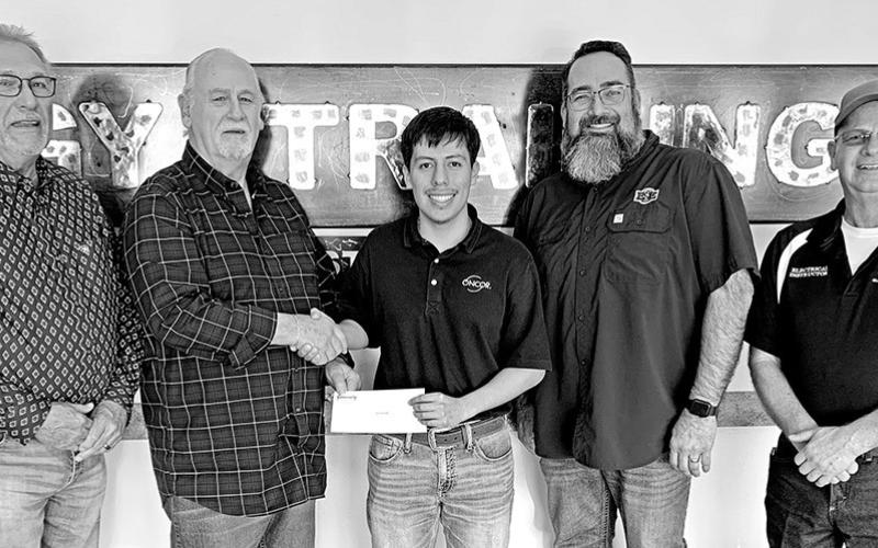 (L to R) Eddie Perritt, Erman Hensel, Christian Flores (Award recipient), Jason Jetton, Tim Davis COURTESY PHOTO