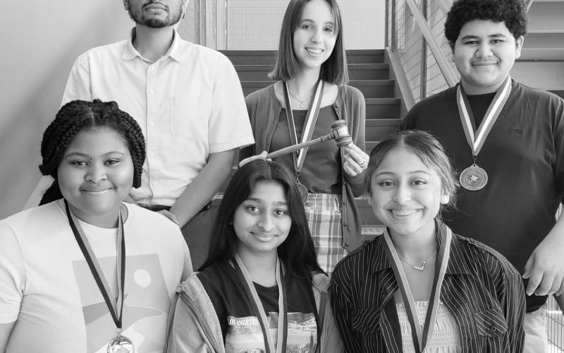 First row L to R: Kiara Rundles, Gopi Amin, Angie Hernandez. Second row L to R: Coach Enrique Martinez, Connelly Cowan, Anthony Orellana