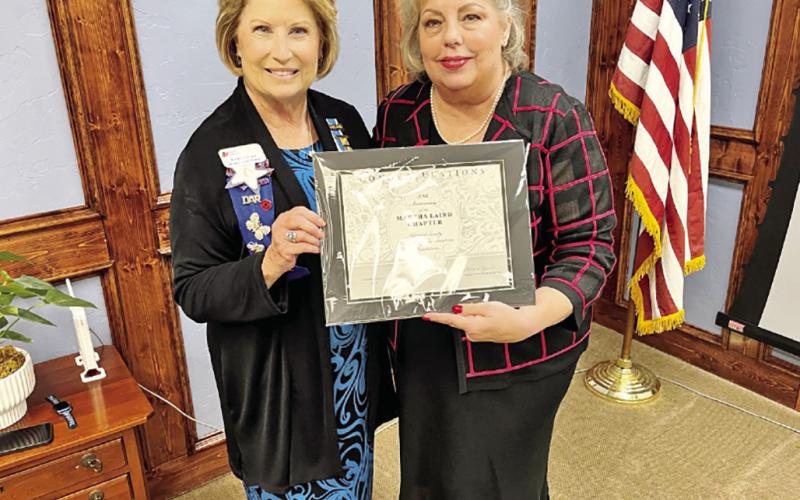 District Director Tamara Moler presented Chapter Regent Kathryn Cash a Certificate of Congratulations. COURTESY PHOTOS