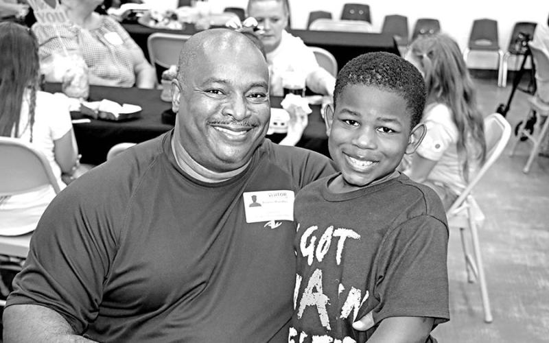At E.C. Brice Elementary, Dr. Tony Rundles joined his grandson, Logan Rundles, for lunch.