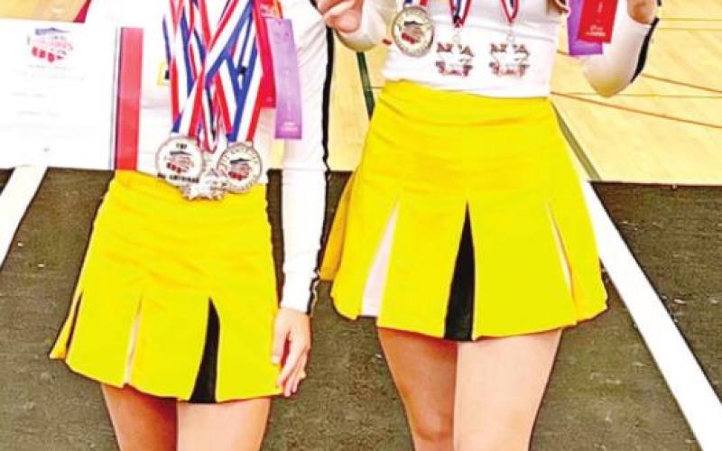 Top individual awards went to sophomore Addy Long (left) and junior Kennady Mayben (right)