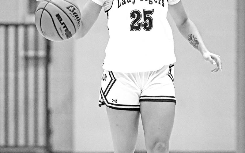Kaylin Brannon brings the ball up for the Lady Tigers vs Hallsville. Brannon finished with 22 points for the Lady Tigers.