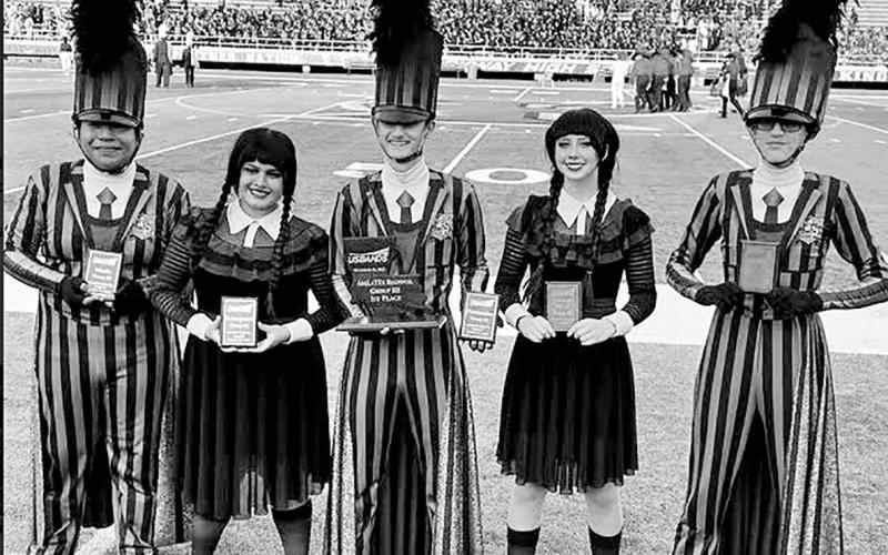 The MPHS Goin’ Gold Band Drum Majors and Color Guard officers with their awards (L to R): Jose Fuentes, Jocelyn Marroquin, Shpat Zeqaj, Addison Heeren, Orion Senence
