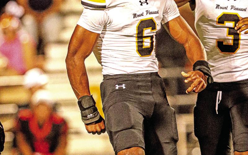 Defensive End/Tight End Emmanuel Harris celebrates after he sacks Texas High’s quarterback. Harris-5 tackles and 1 sack + 1 receiving TD