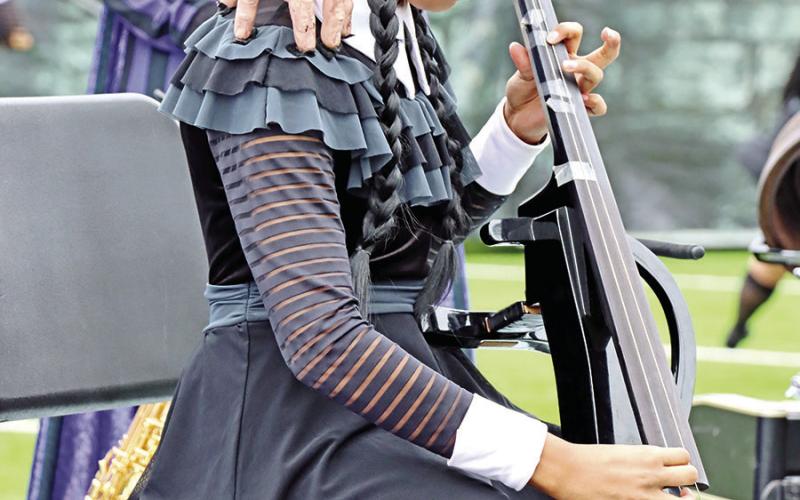 “Wednesday”, Dalia Balderas, plays the cello at the beginning of the performance