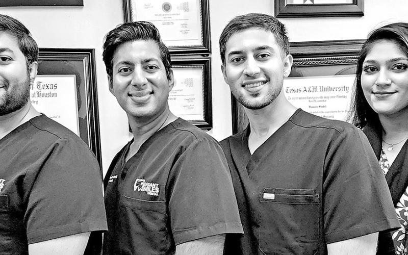 (Left to right) Dr. Rehan Shahid, Dr. Husnain Shahid, Dr. Husban Shahid, Sanum Shahid TRIBUNE PHOTOS / NICOLE KIMBALL