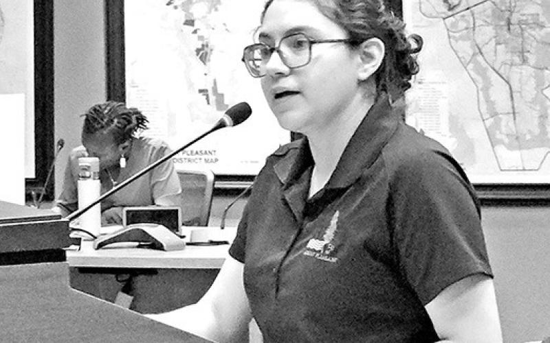 Library Director Lupe Herrera tells the council and public about the library grants TRIBUNE PHOTO / NICOLE KIMBALL