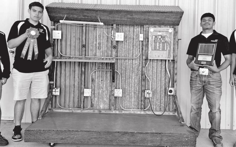 Commercial Wiring Exhibit L-R: Carlos Valdez, Eric Perez, Sahir Ramirez, Gabriel Acuna, Jr. COURTESY PHOTOS