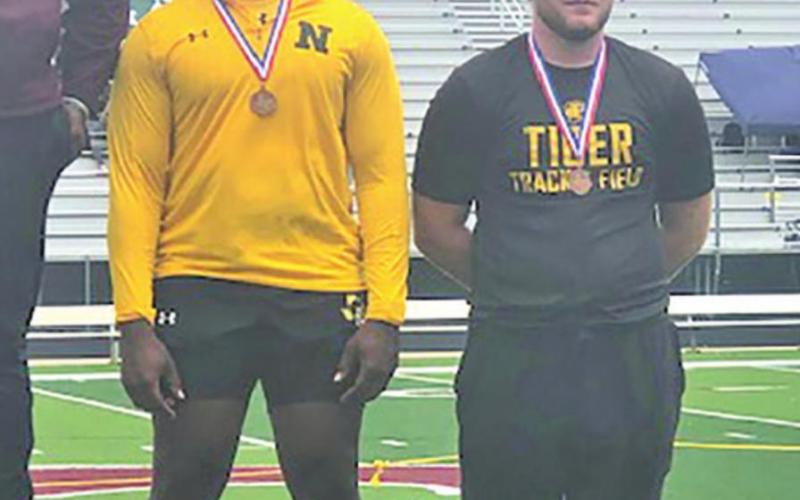 Astin Ledbetter takes 4th in discus. PHOTOS BY DREW BARKLEY