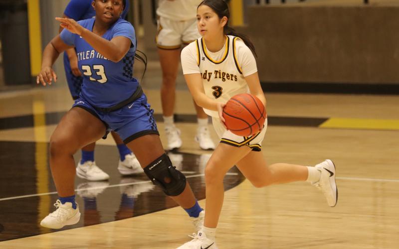 Melany Morales drives the lane against the Lady Lions.  Morales led all scorers with 21 points including six from long range.