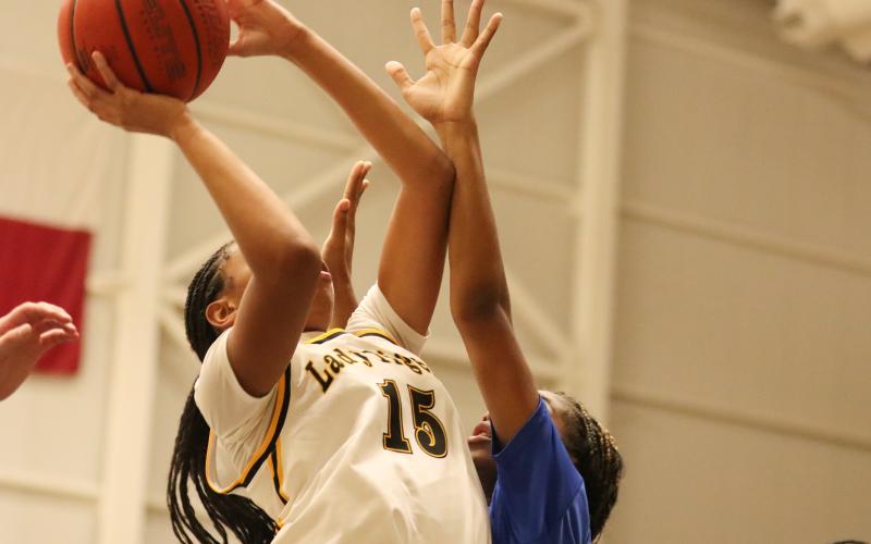 Shannon Hines attacks the paint as the Lady Tigers dominate Tyler.