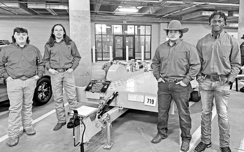 Tytus Nance, Ethan Easley, Brazos Brown, and Braylon Jones earned a blue ribbon for their Hydraulic Tilt Deck Trailer