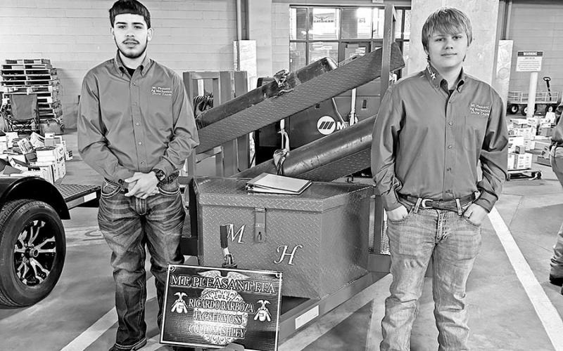 Ricardo Barboza and Jagger Moss with their Welding Trailer