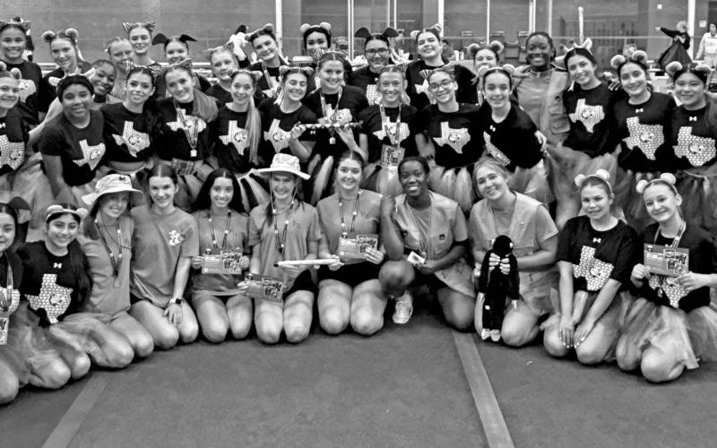 The MPHS cheerleaders with the UCA staff and their camp awards