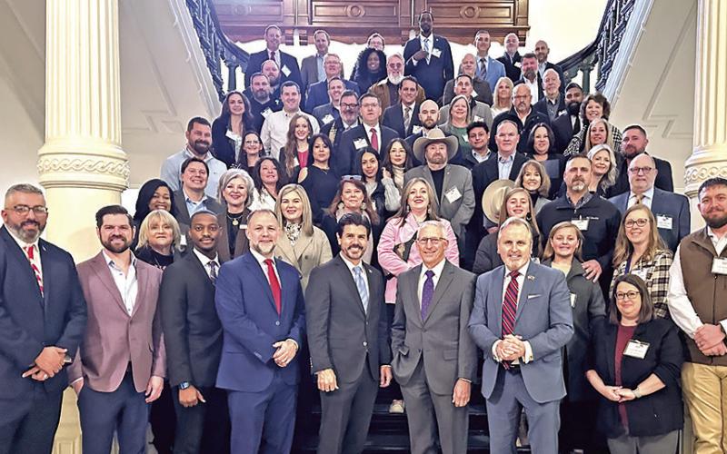 Members of the Northeast Texas Regional Alliance pose for a photo with U.S. Congressman Nathaniel Moran, State Senator Bryan Hughes (District 1), and State Representatives Gary VanDeaver (District 1), Brent Money (District 2) and Cole Hefner (District 5) during the 2025 Legislative Summit held in Austin, Texas on Feb. 19. COURTESY PHOTO / TINA BELL