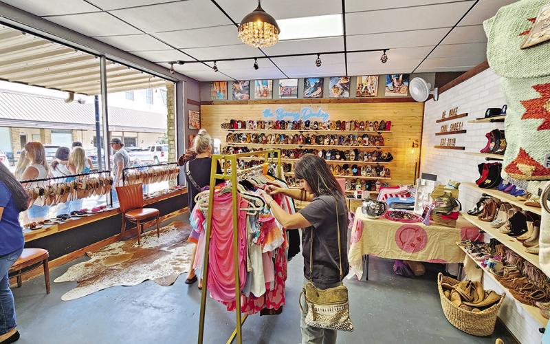 Owner Carline Ayers welcomes customers on the first day
