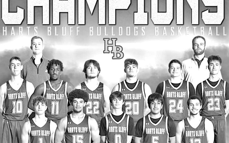 The Harts Bluff Bulldogs clinched this District 16-2A Championship last week with an 11-1 league record and will head into the playoffs at 26-10 overall. Team members are, top row from left to right: Matthew Rowland, Noah Carr, Hunter Green, Kayden Mason, Liam Cobb and Jack Kimball; and bottom row from left: Kason Viramontes, Cayden James, Brodee Carrell, Yonathan Bocanegra and Avyn Carrington. Head Coach is Bradley Lambeth (left) and Thomas Crane (assistant). Not pictured is Jeremiah Adams. COURTESY PHOTO
