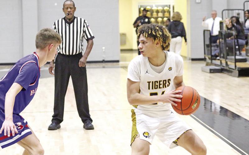 Mount Pleasant’s Carter Chism scans the floor during Tuesday’s game against Bullard. The Tigers defeated the Panthers in a battle of state-ranked squads, 52-35. TRIBUNE PHOTO / QUINTEN BOYD