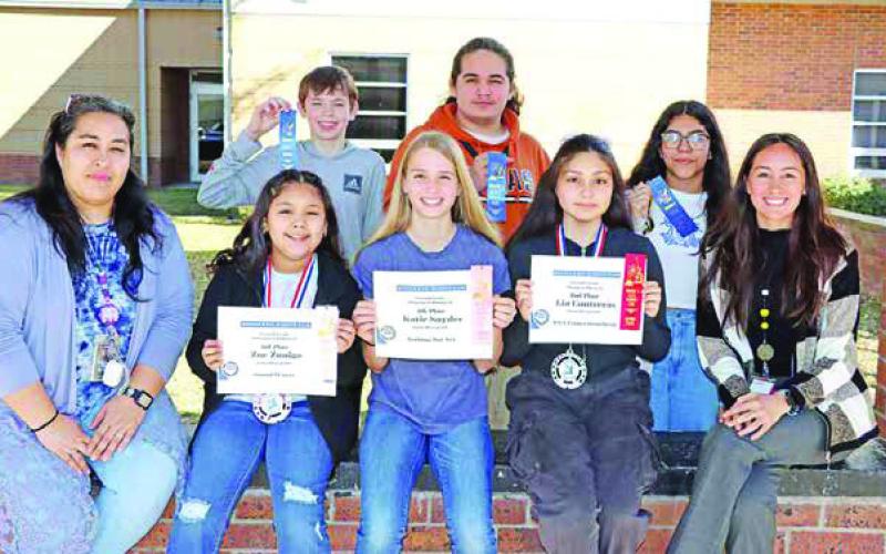MPJH: Front (L to R) Advisor Maria Sanchez, Zoe Zuniga, Katie Snyder, Lia Contreras, Advisor Martina Ramirez. Back (L to R) Aiden Lane, Jose Olivares, Angela Ramirez