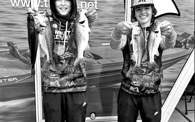 Joe Setina (left) and Hayden Harvill with their catches of the day