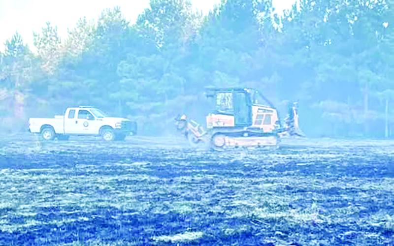 Wildfire burns woods near Lake Bob Sandlin