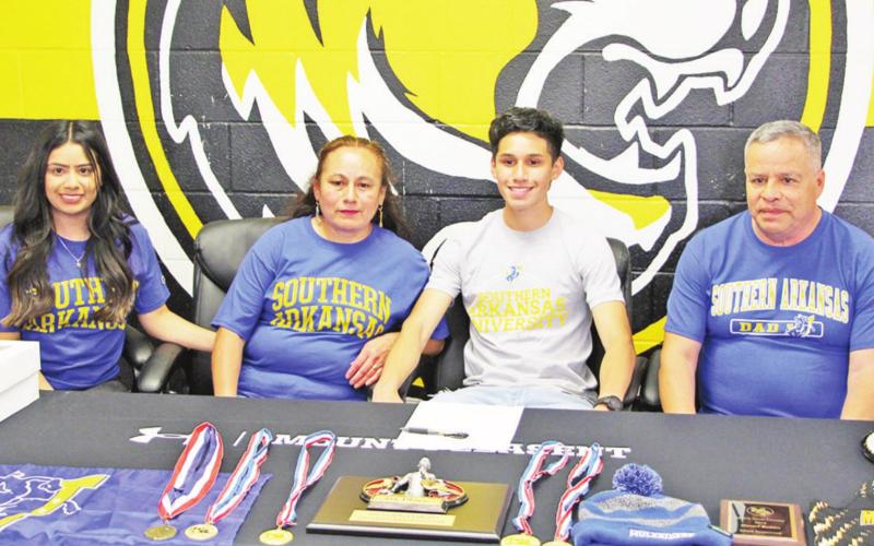 Mount Pleasant distance and cross-country runner Daniel Robles recently signed his letter of intent to run at Southern Arkansas University. Robles has been a district champion in the 1,600 meters, 3,200 meters and in cross-country. COURTESY PHOTO / MPISD